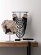 ML-890932-Fossil-statue-ML-890940-Magic-black-statue_sf1_DTP